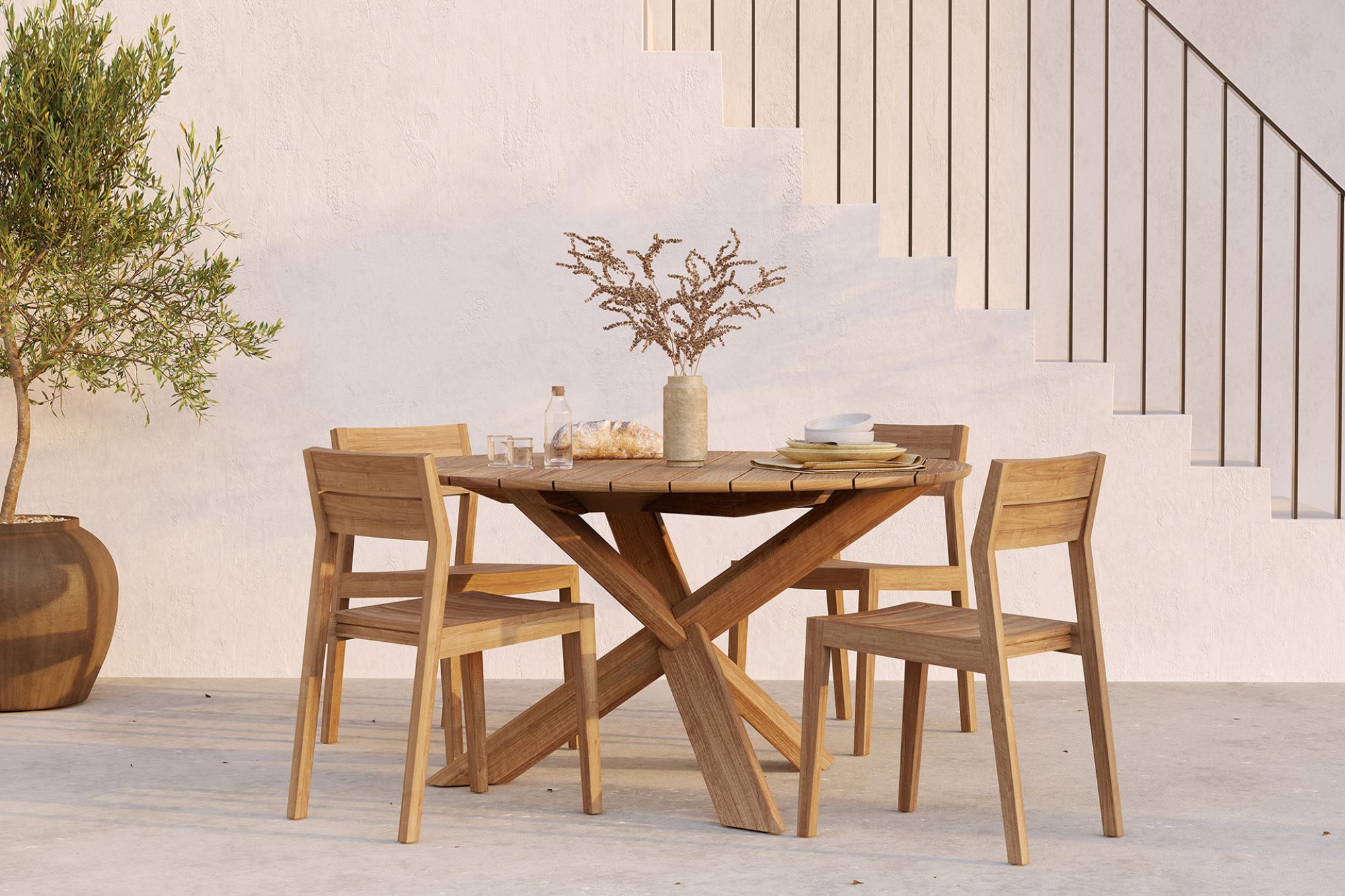 Round teak garden table set with four chairs, minimalist outdoor furniture handcrafted in Jepara