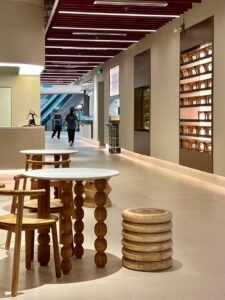 Hospitality furniture suppliers: teak dining chairs and stacked ring stools