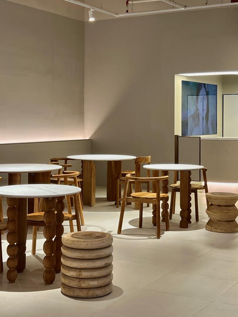 Hospitality furniture suppliers: solid teak dining table with bead-turned legs