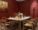 Custom solid teak dining set with a long table and eight armchairs in Super Kimchi private dining room in Johor Bahru, Malaysia.