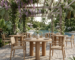 Hospitality furniture sets featuring round teak tables and woven chairs at a luxury resort poolside by ikiteak.