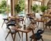 Solid teak restaurant furniture in a tropical dining interior